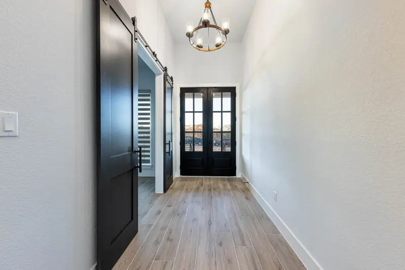 Entry hall, Farmhouse Hill Country Retreat (RenovatePros project)