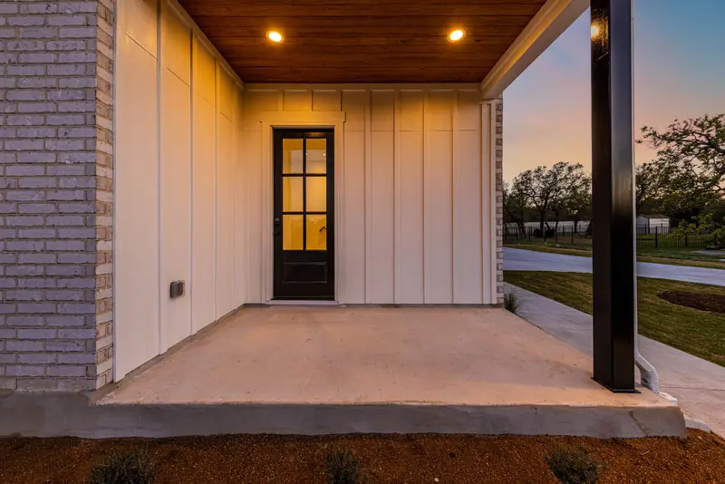 Covered patio, Farmhouse Hill Country Retreat (RenovatePros project)