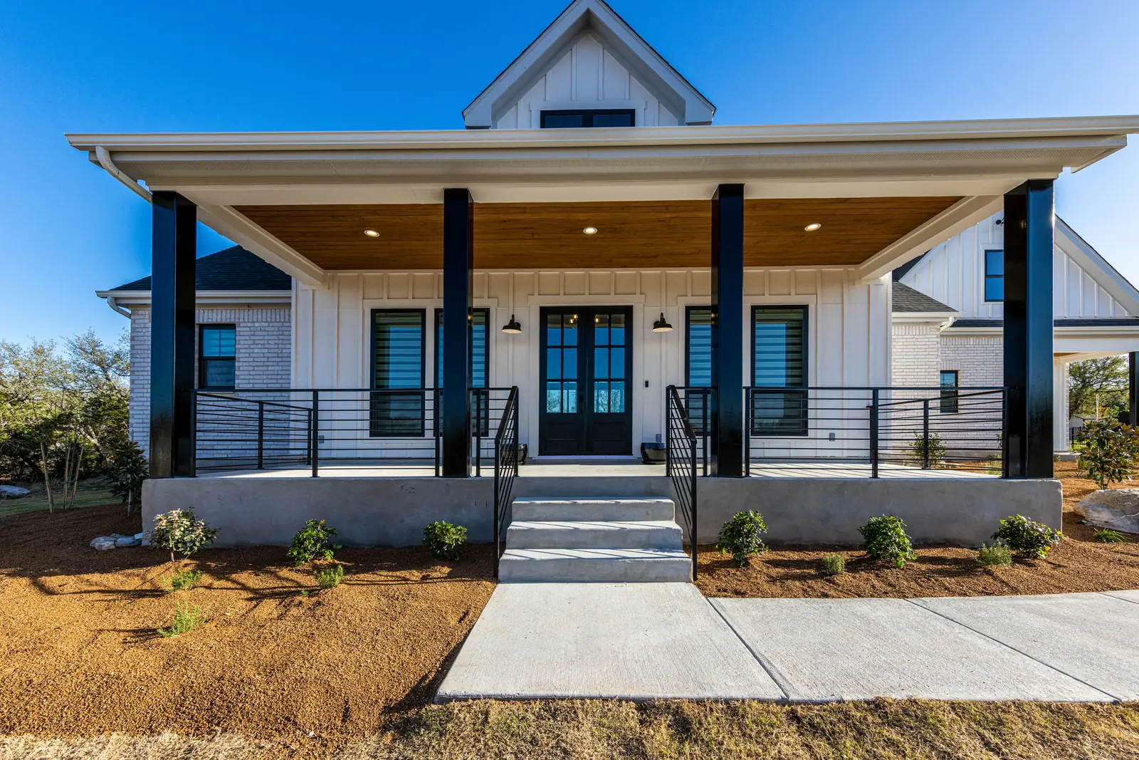 Front porch, Farmhouse Hill Country Retreat (RenovatePros project)