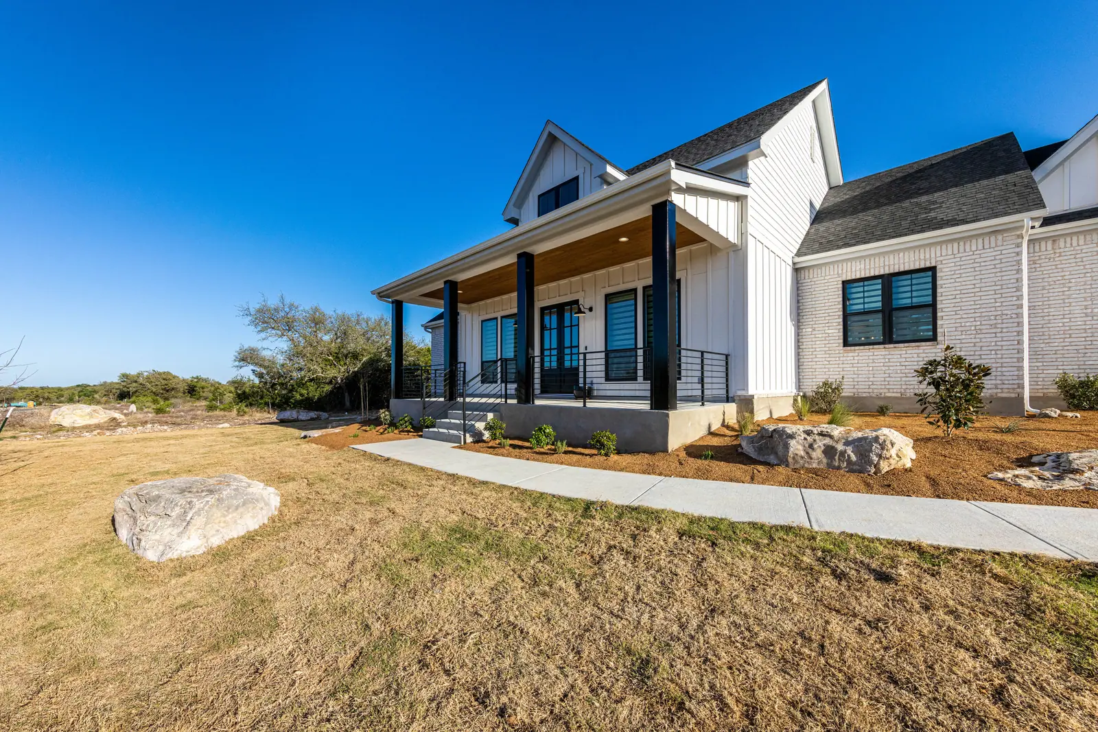 Front porch, Farmhouse Hill Country Retreat (RenovatePros project)