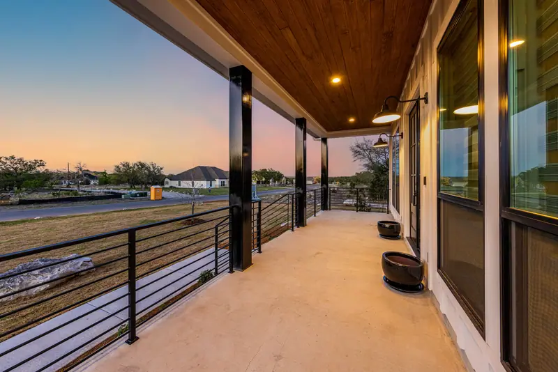 Covered patio, Farmhouse Hill Country Retreat (RenovatePros project)