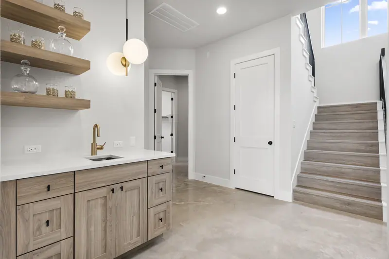 Kitchen and stairs, Round Mountain Modern Farmhouse (RenovatePros project)