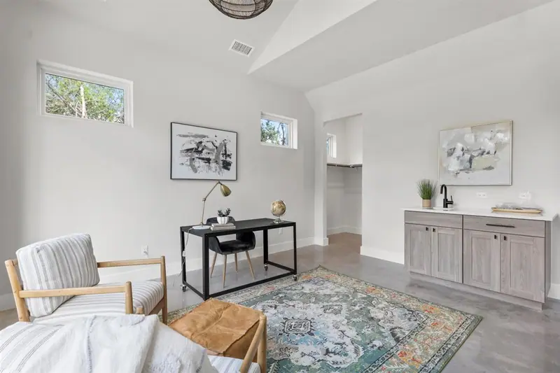 Study with a desk, an area rug and a built-in cabinet, Round Mountain Modern Farmhouse (RenovatePros project)