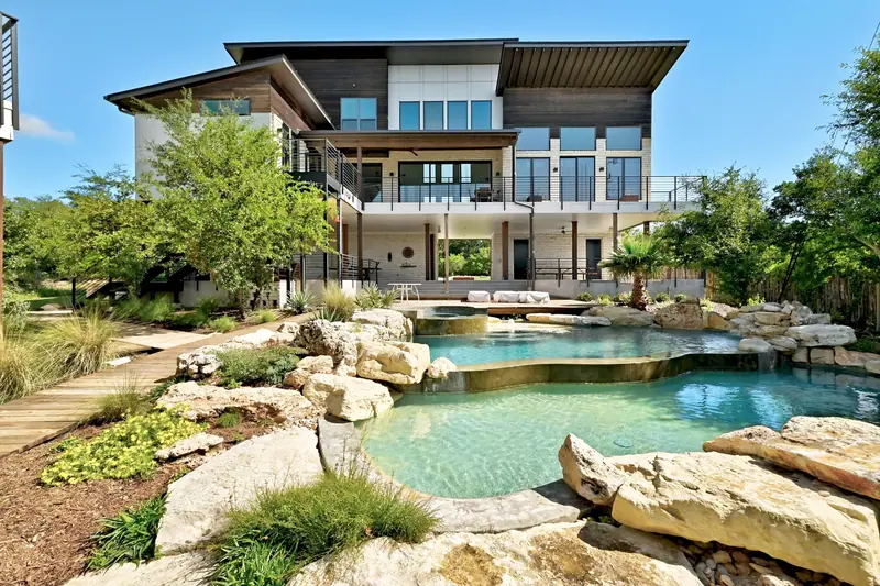 Pool and homes, Spicewood Lake Retreat (RenovatePros project)